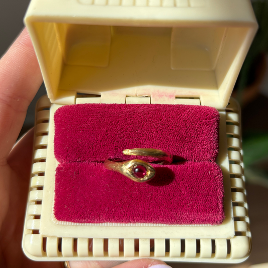 18k snake ring with garnet eye