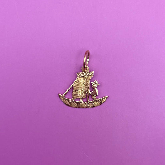 18k meso gondola man charm