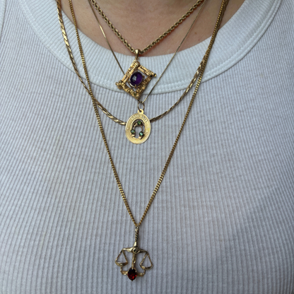 14k libra with garnet stone charm by Michael Anthony