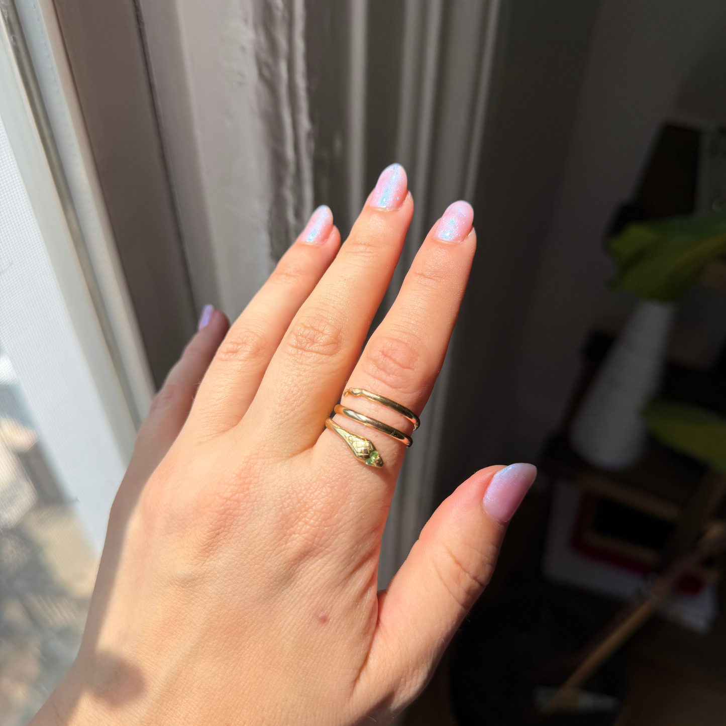 18k wrap around snake ring with tsavorite eyes