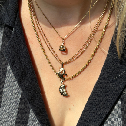 the moon face charm