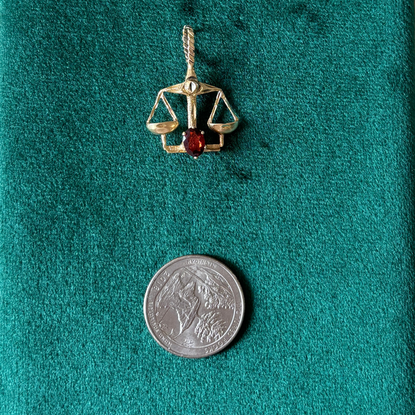 14k libra with garnet stone charm by Michael Anthony