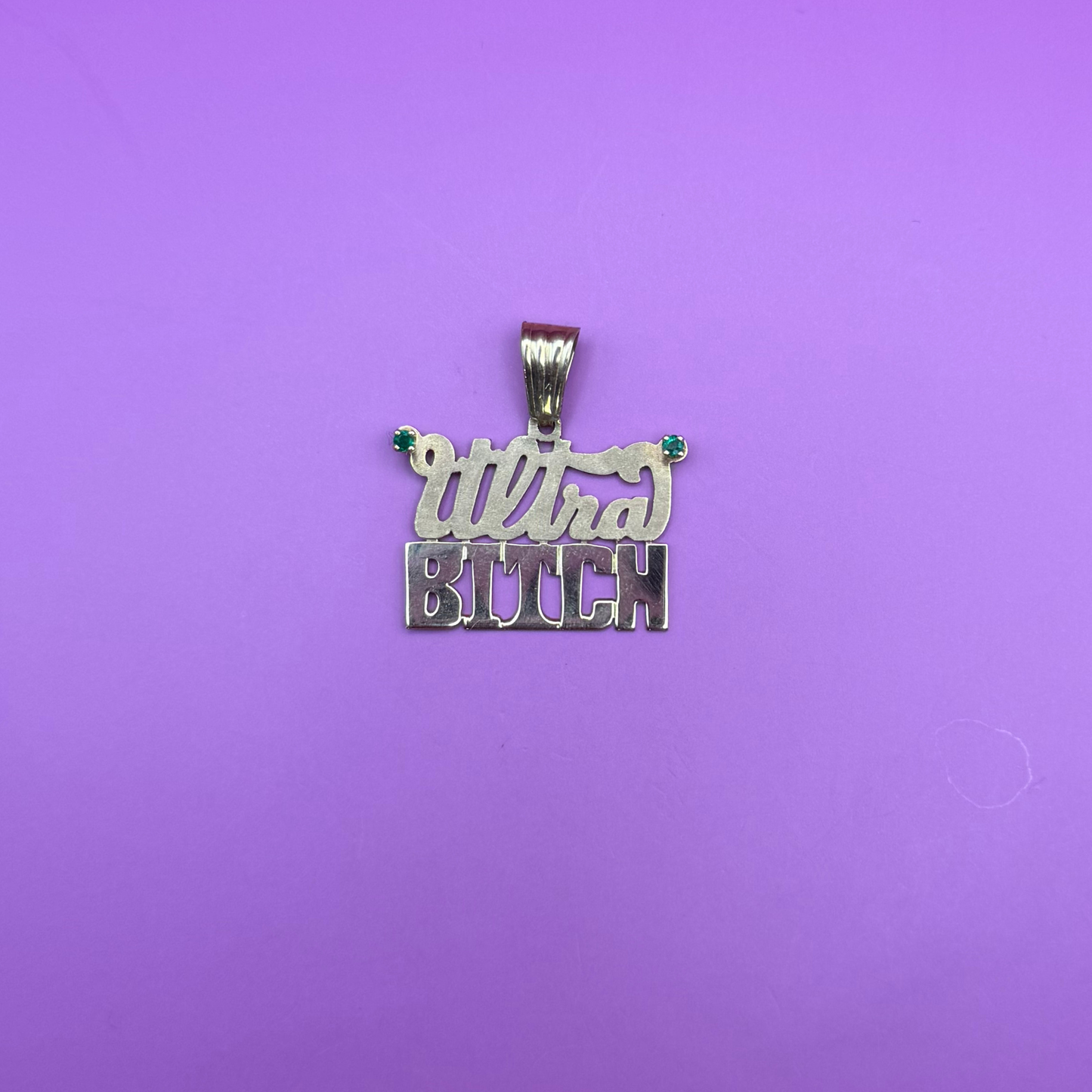 14k ultra bitch with emeralds charm