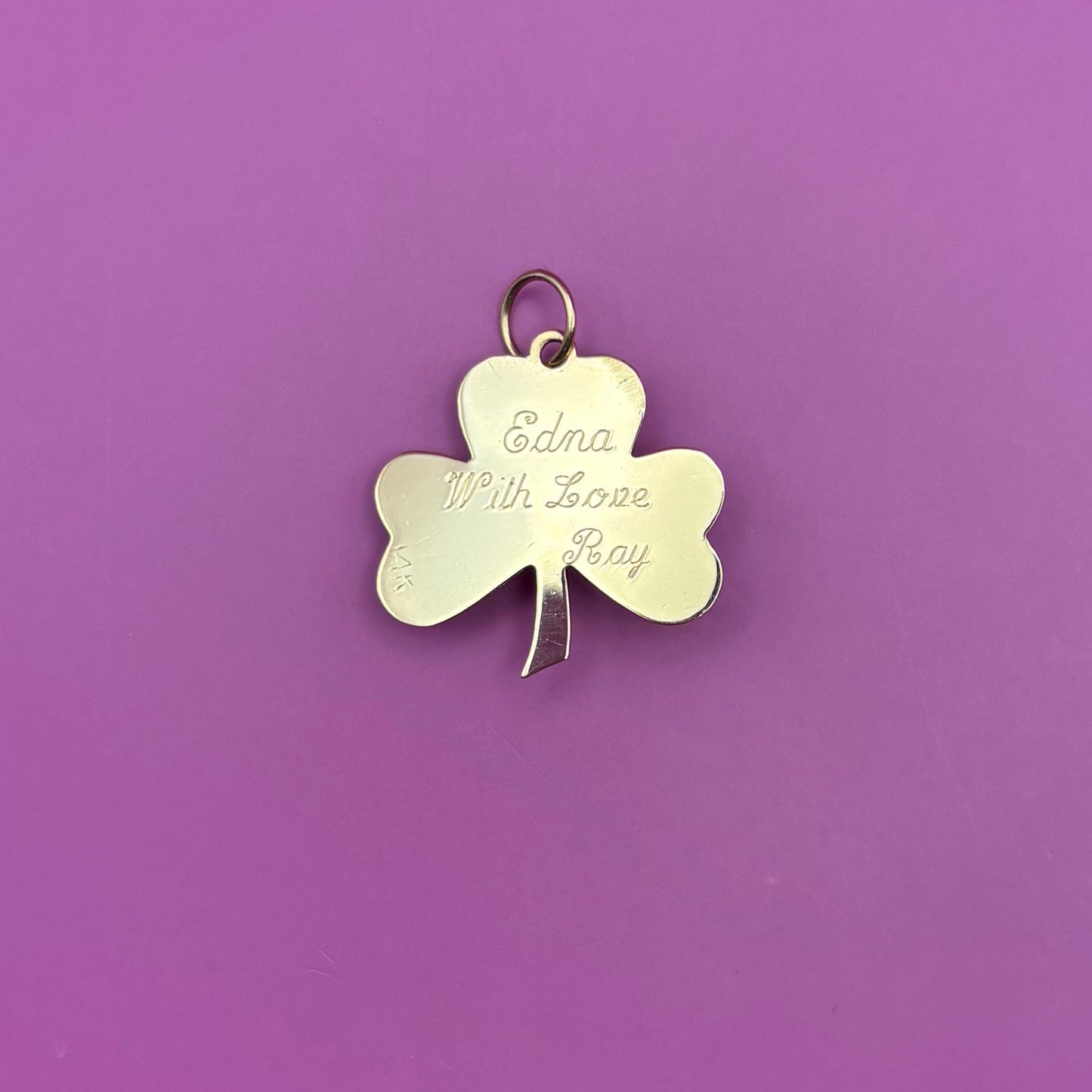 14k engine turned 3 leaf clover with blue topaz charm