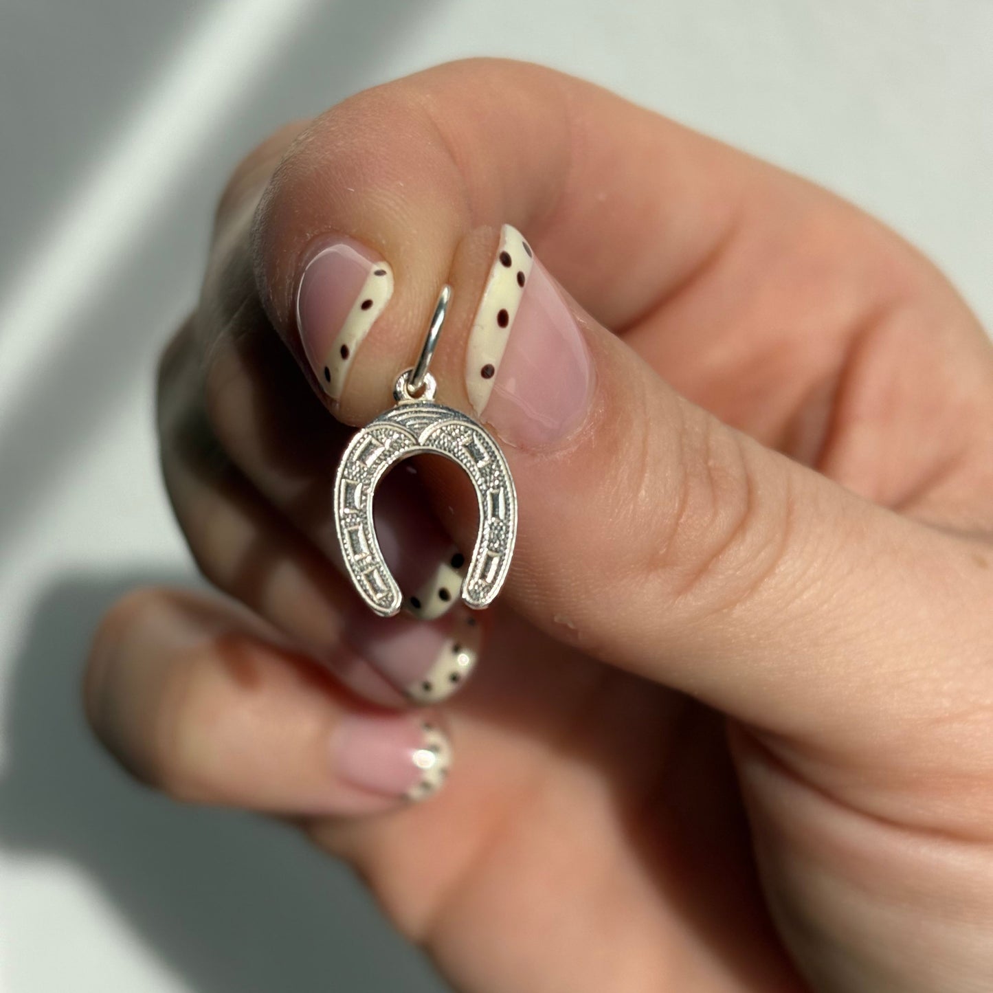 silver horseshoe charm