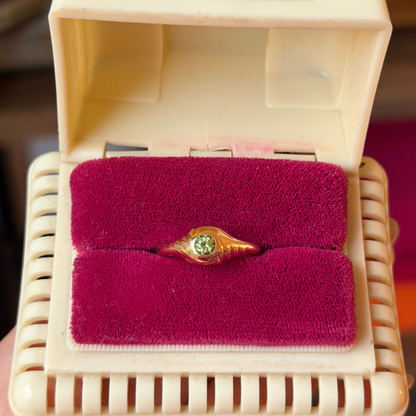 14k eye of the storm ring with peridot