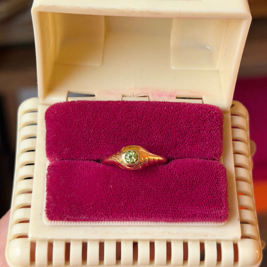 14k eye of the storm ring with peridot