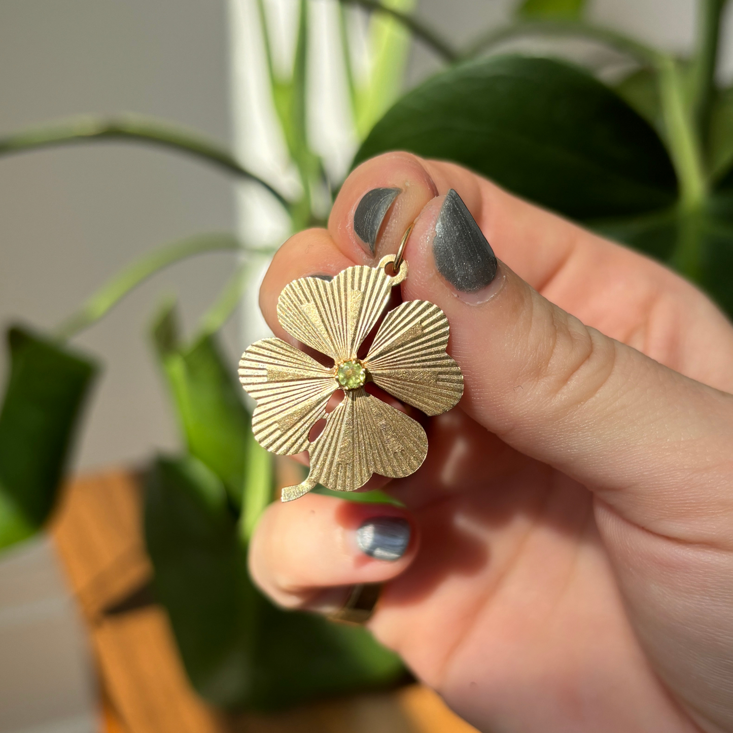 14k four leaf clover with peridot charm