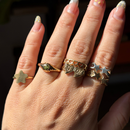 14k eye of the storm ring with peridot
