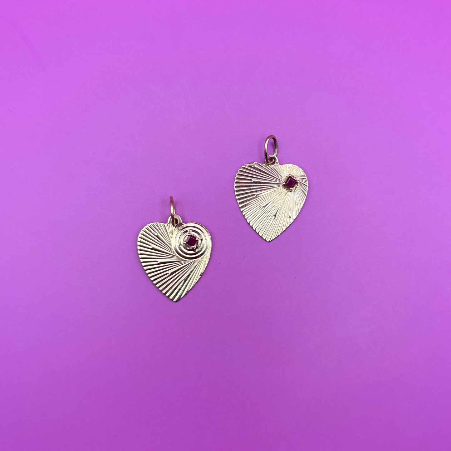 14k engine turned heart with ruby charm