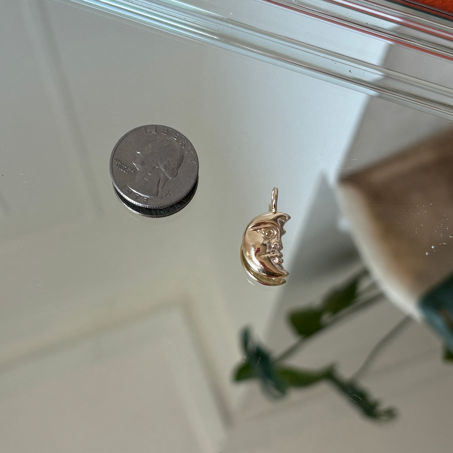 the moon face charm