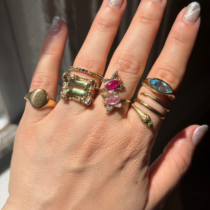 18k wrap around snake ring with tsavorite eyes