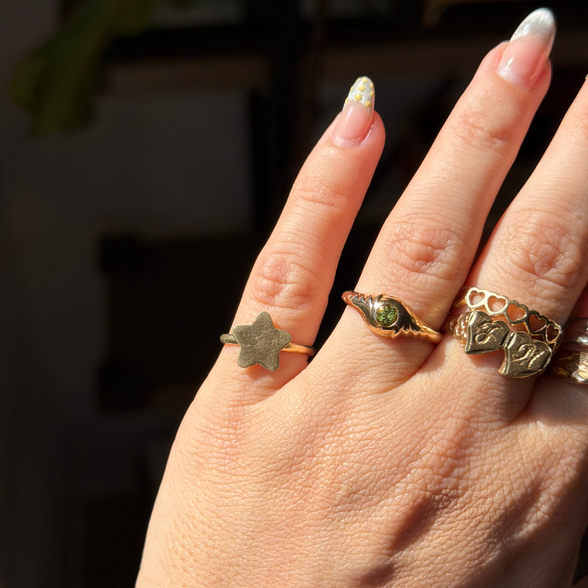 14k eye of the storm ring with peridot