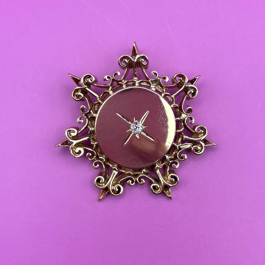 14k Victorian brooche conversion with star set diamond pendant