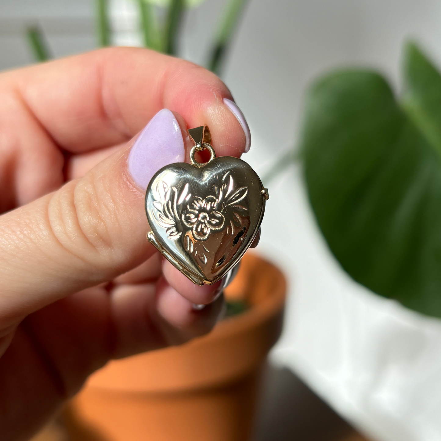 14k heart locket with flower and leaf motif engraving