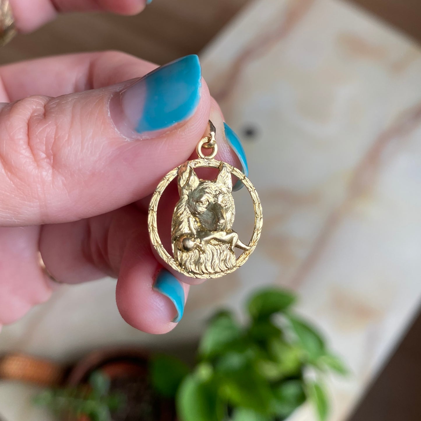 18k wolf with naked babe charm