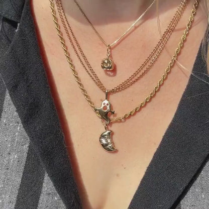 the moon face charm