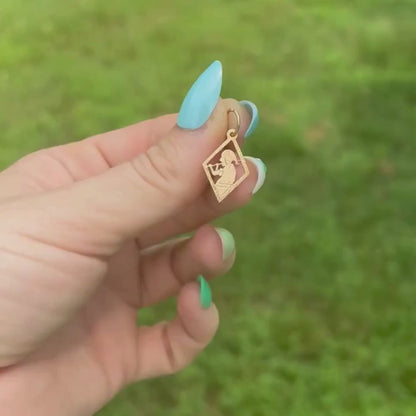 18k meso woman with flute charm