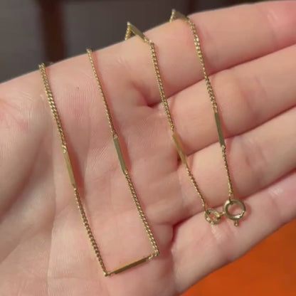 18k curb bar station chain by Unoaerre 16"
