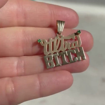 14k ultra bitch with emeralds charm