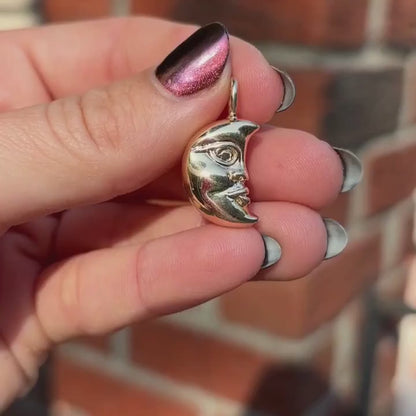 the moon face charm