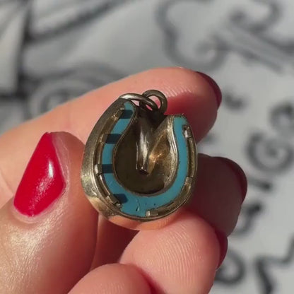 9k horseshoe with blue enamel locket