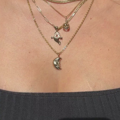 the moon face charm