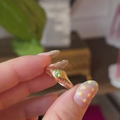 14k eye of the storm ring with peridot