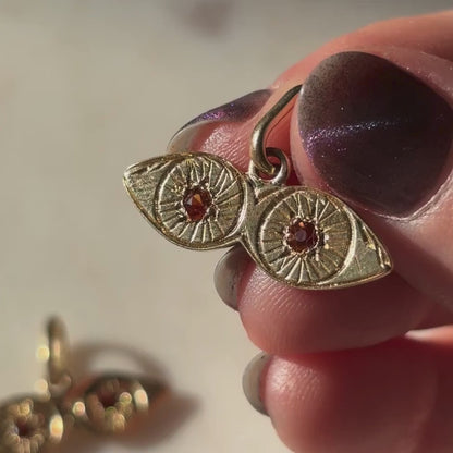 14k garnet eyes charm